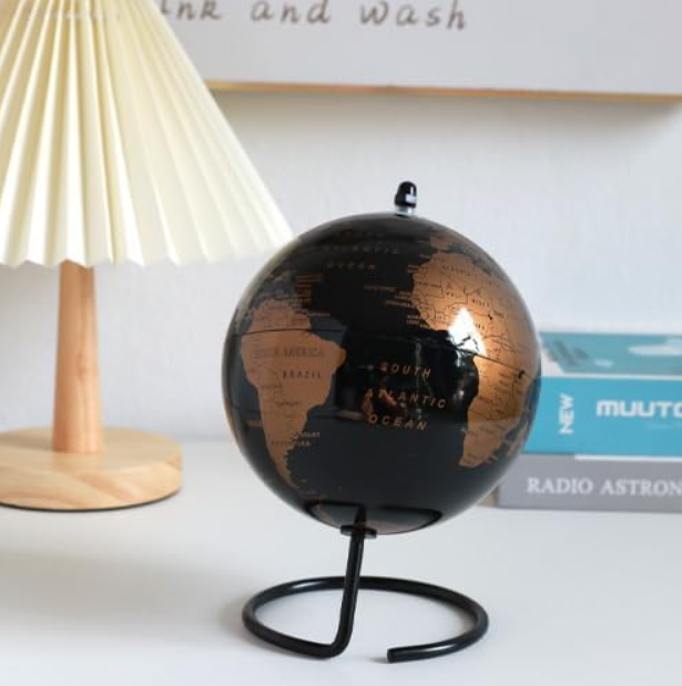 Mappamondo nero e oro rosa